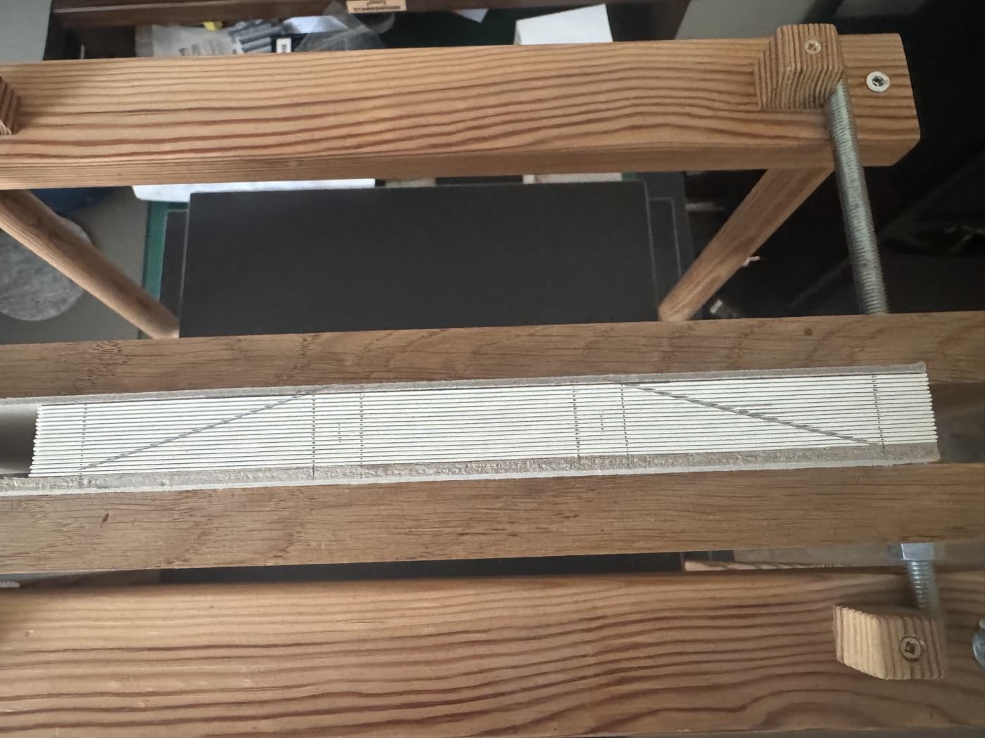 Sewing stations marked along the spine