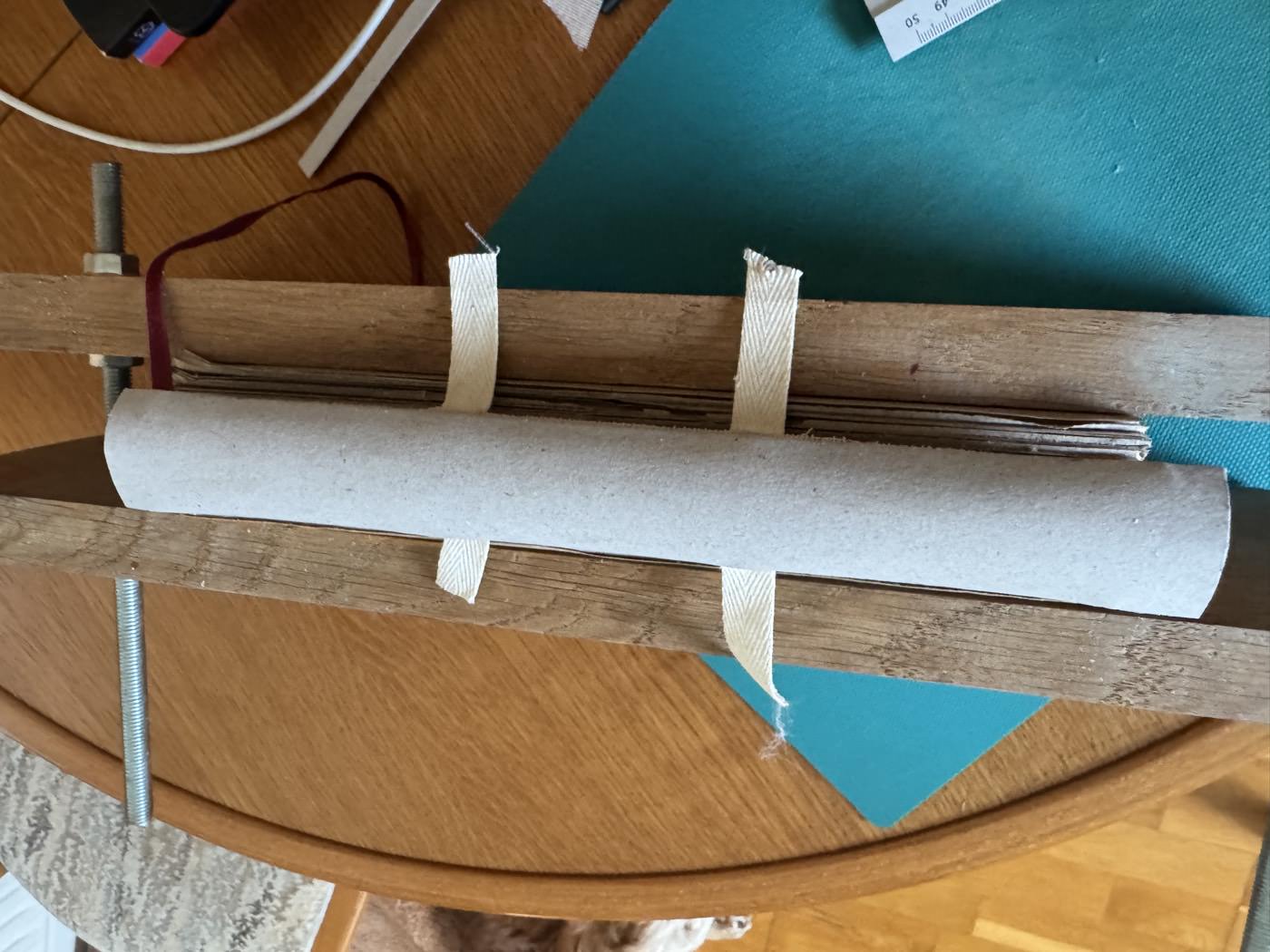 Backing the spine before covering